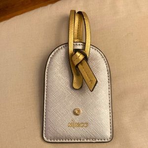 NWOT mimco luggage tag